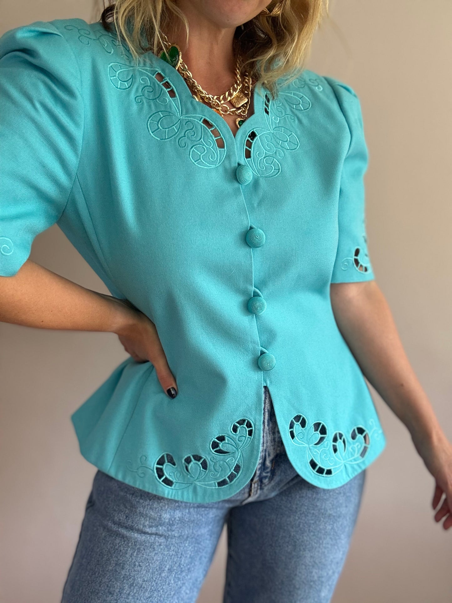 Vintage teal jacket with cut-out details