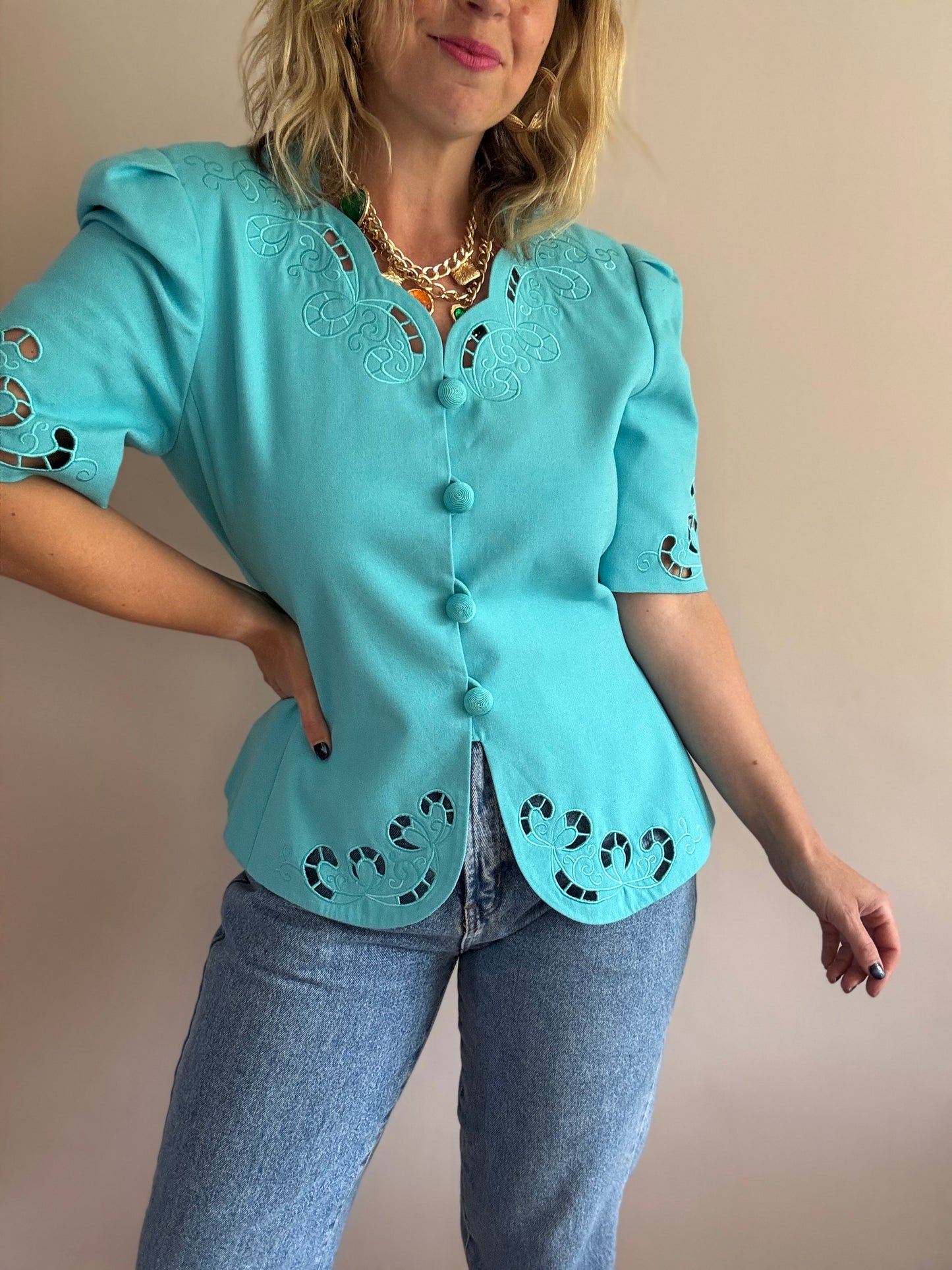 Vintage teal jacket with cut-out details