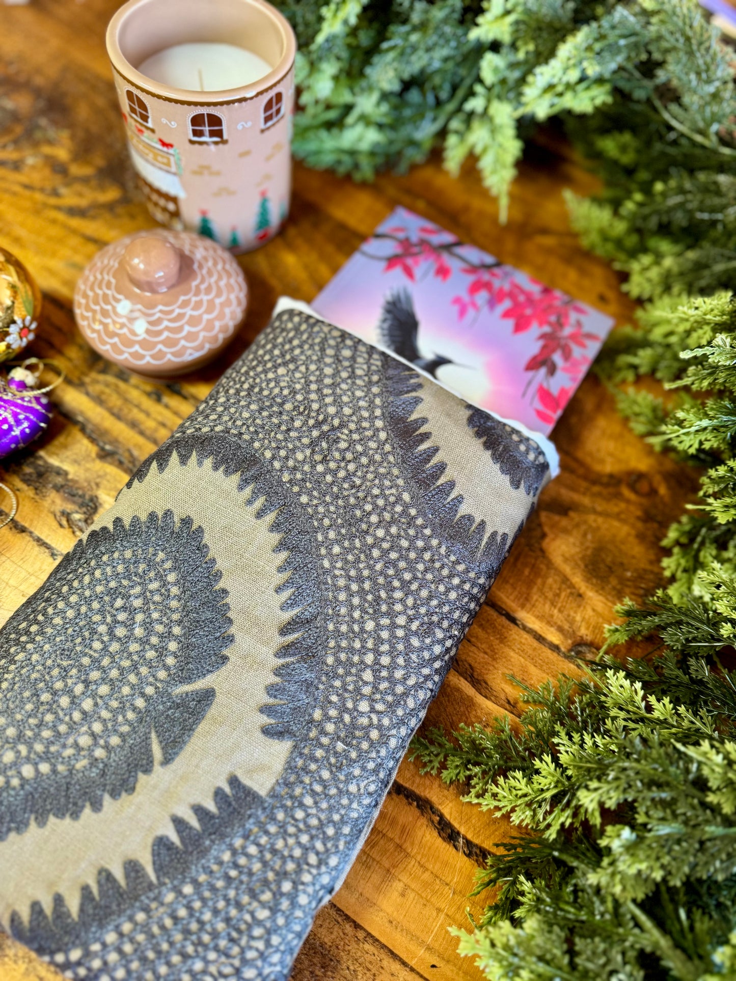 ‘Henna’ embroidered linen book bed.