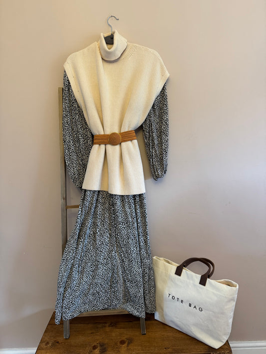 Cream roll neck sleeveless knit