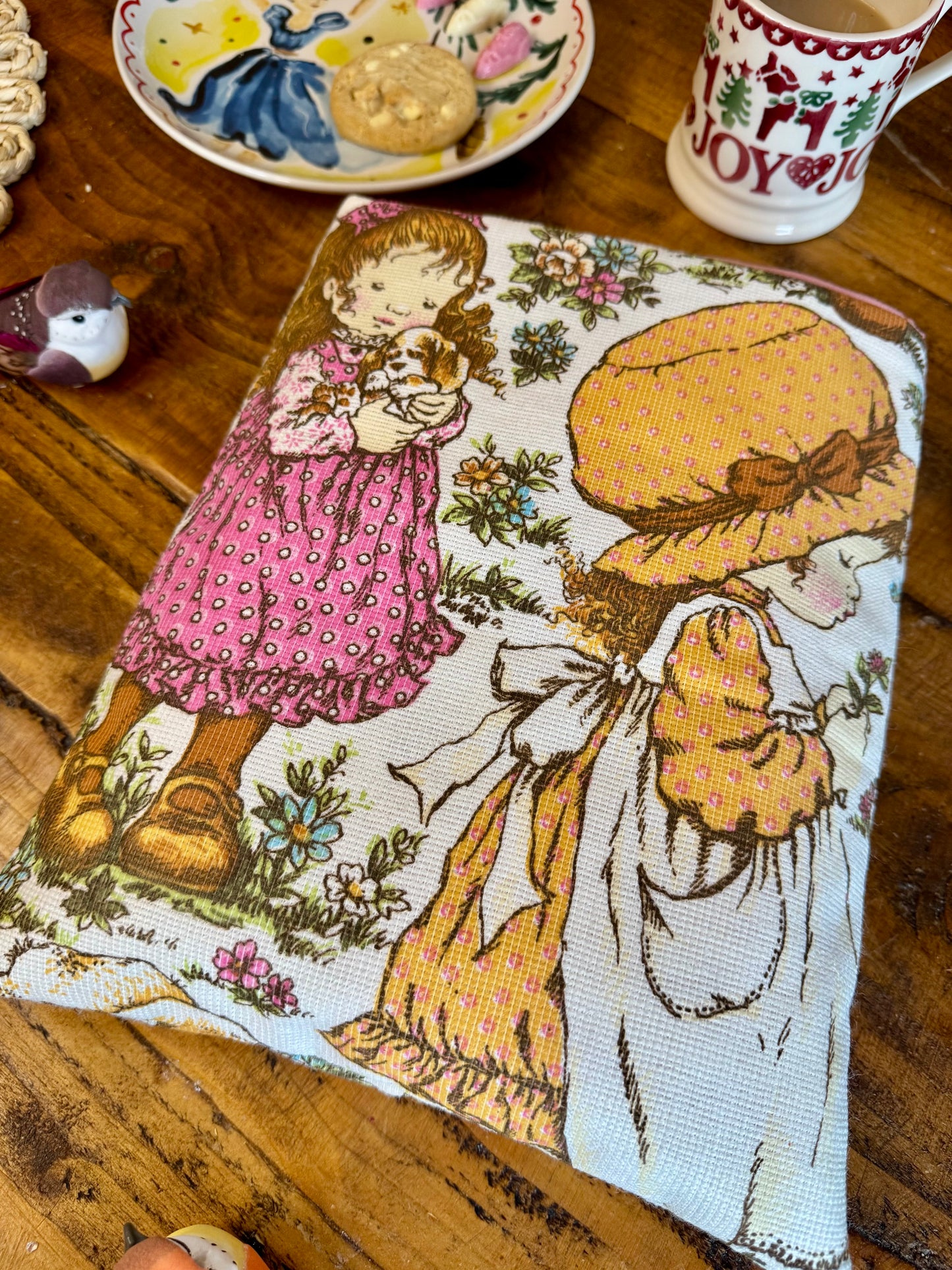 ‘Holly Hobby’ picking flowers large book bed