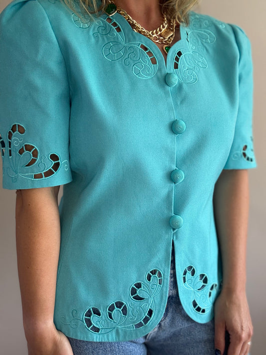 Vintage teal jacket with cut-out details