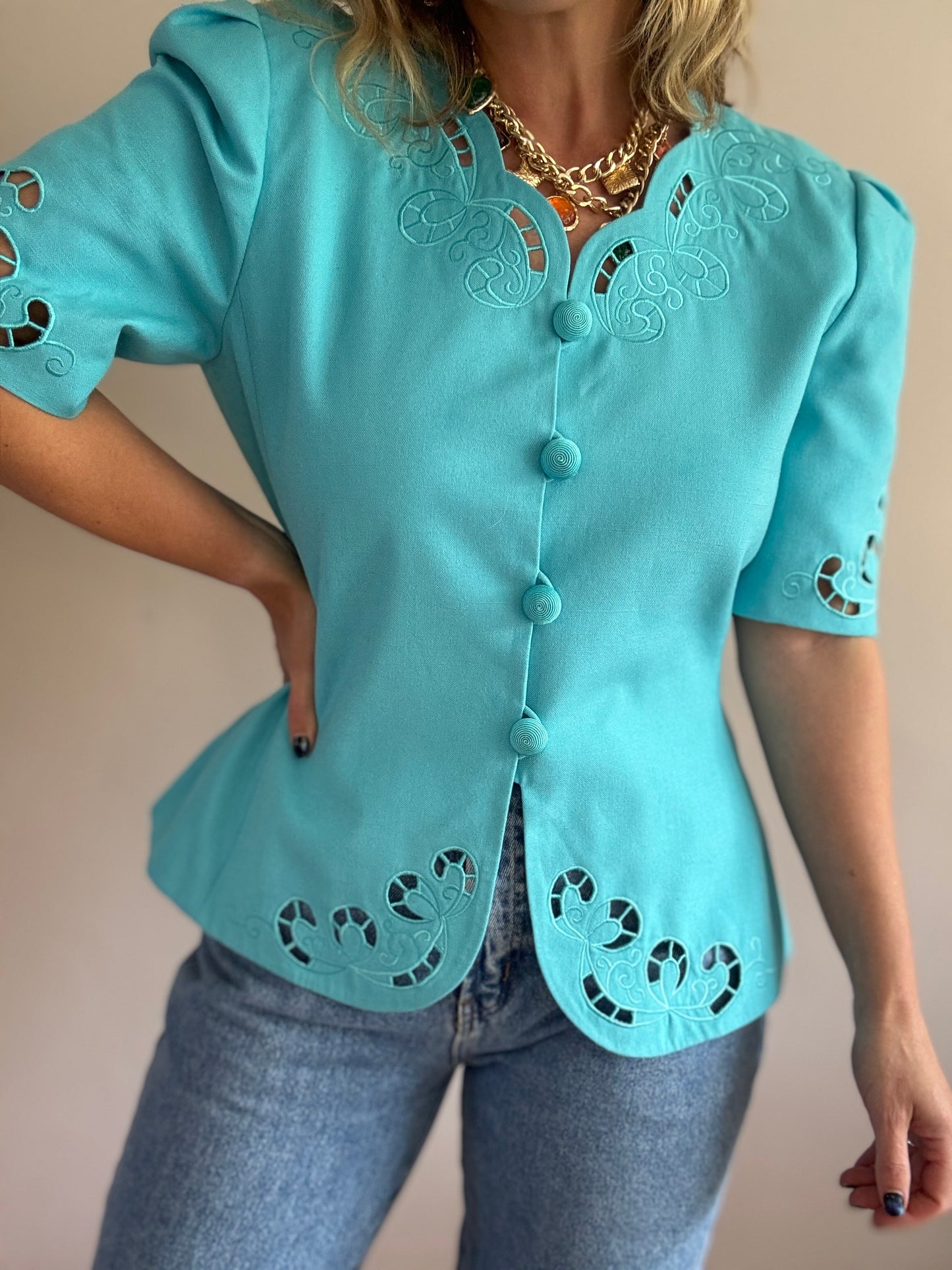 Vintage teal jacket with cut-out details