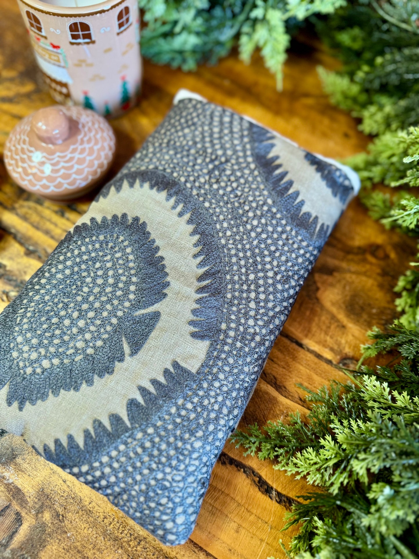 ‘Henna’ embroidered linen book bed.